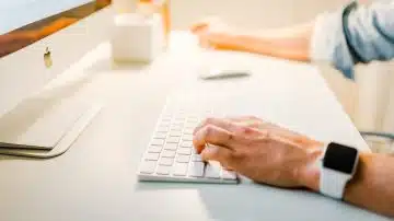 person using iMac