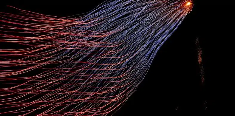 red and blue lights from tower steel wool photography